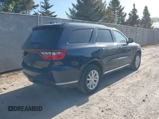 2015 Dodge Durango SXT with VIN 1C4RDJAG3FC870183, listed as a IAAI auction lot 42223579 with 66,547 mi miles and . Bid and sale history available at DreamBid. Image 4.