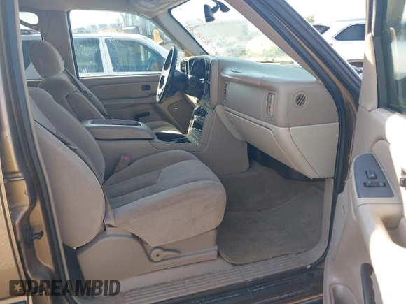 2004 Chevrolet Tahoe LT z VIN 1GNEC13Z04R130978, wystawiony jako IAAI lot #42073871 z przebiegiem 214 947 mil mil oraz . Historia ofert i sprzedaży dostępna na DreamBid. Obrazek 5.