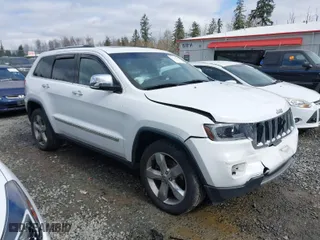 2013 Jeep Grand Cherokee Limited with VIN 1C4RJFBT0DC619216, listed as a IAAI auction lot 41703137 with 142,577 mi miles. Bid and sale history available at carsss.com. Image 13.