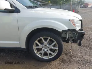 2013 Dodge Journey Crew with VIN 3C4PDCDG0DT591533, listed as a IAAI auction lot 42630548 with 164,961 mi miles and . Bid and sale history available at DreamBid. Image 17.
