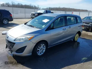 2013 Mazda 5 Sport with VIN JM1CW2BL6D0146696, listed as a IAAI auction lot 41657255 with 142,939 mi miles and . Bid and sale history available at DreamBid. Image 21.
