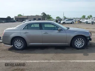 2014 Chrysler 300 with VIN 2C3CCAAG3EH322855, listed as a IAAI auction lot 42053129 with 172,687 mi miles. Bid and sale history available at carsss.com. Image 14.
