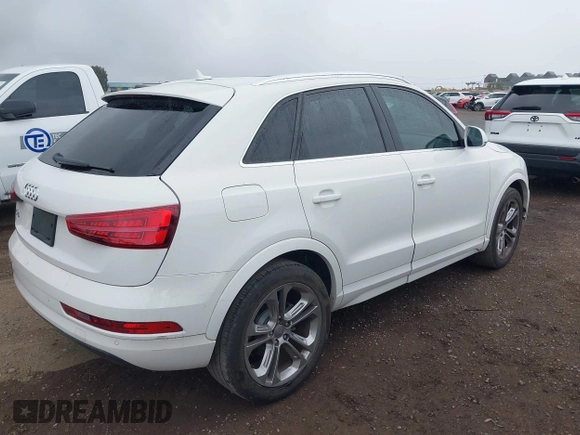 2016 Audi Q3 Premium Plus with VIN WA1BFCFS0GR009654, listed as a IAAI auction lot 42141372 with 138,992 mi miles. Bid and sale history available at carsss.com. Image 4.