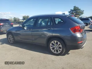 2013 BMW X1 xDrive28i with VIN WBAVL1C52DVR91167, listed as a Copart auction lot 49090395 with 74,323 mi miles and Clean Title. Bid and sale history available at carsss.com. Image 2.