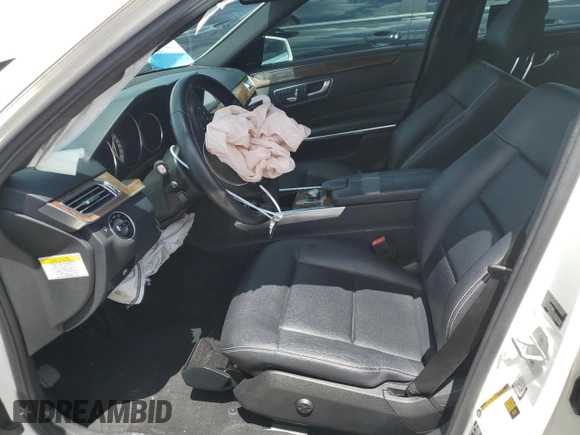 2014 Mercedes-Benz E 350 Sport with VIN WDDHF5KB5EA967675, listed as a Copart auction lot 52763995 with 68,902 mi miles and Salvage title. Bid and sale history available at DreamBid. Image 7.