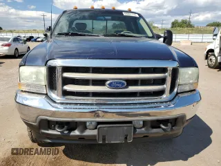 2002 Ford Super Duty F-250 XL with VIN 1FTNX21S92EC88121, listed as a Copart auction lot 68001114 with 145,635 mi miles and Clean Title. Bid and sale history available at carsss.com. Image 5.