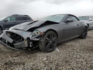 2011 Jaguar XK with VIN SAJWA4EC6BMB39972, listed as a Copart auction lot 70690864 with 98,364 mi miles and Salvage Title. Bid and sale history available at carsss.com. Image 1.