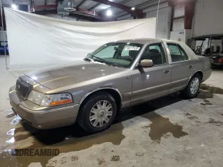 2005 Mercury Grand Marquis GS with VIN 2MEFM74WX5X614325, listed as a Copart auction lot 88117535 with 128,975 mi miles and Clean Title. Bid and sale history available at DreamBid. Image 1.