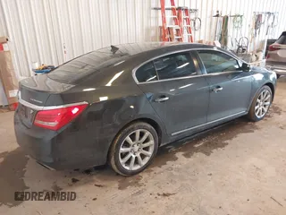 2014 Buick LaCrosse Premium I with VIN 1G4GD5G36EF305227, listed as a IAAI auction lot 41663704 with 142,230 mi miles and . Bid and sale history available at DreamBid. Image 4.