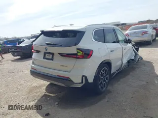 2023 BMW X1 xDrive28i with VIN WBX73EF07P5W32455, listed as a IAAI auction lot 41825701 with 12,453 mi miles and . Bid and sale history available at DreamBid. Image 4.