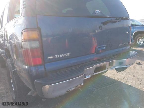 2002 Chevrolet Tahoe LT with VIN 1GNEK13Z42J140816, listed as a IAAI auction lot 41973686 with 241,722 mi miles. Bid and sale history available at carsss.com. Image 18.