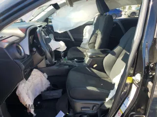 2018 Toyota RAV4 XLE with VIN 2T3RFREV2JW804022, listed as a Copart auction lot 87150944 with Not Provided miles and Salvage Title. Bid and sale history available at DreamBid. Image 7.