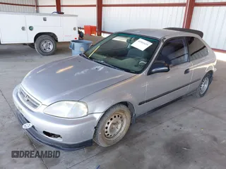 2000 Honda Civic CX with VIN 2HGEJ6329YH109973, listed as a IAAI auction lot 41565435 with 205,462 mi miles. Bid and sale history available at carsss.com. Image 2.