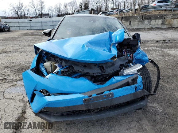 2019 Toyota C-HR XLE with VIN NMTKHMBX4KR097964, listed as a Copart auction lot 50431145 with 0 mi miles and Salvage Title. Bid and sale history available at carsss.com. Image 5.