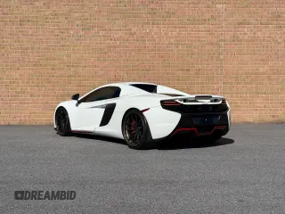 2016 McLaren 650S with VIN SBM11FAAXGW005605, listed as a Copart auction lot 53181285 with 16,800 mi miles and Clean Title. Bid and sale history available at DreamBid. Image 3.