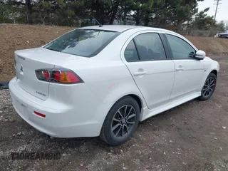 2017 Mitsubishi Lancer ES with VIN JA32U2FU4HU014876, listed as a IAAI auction lot 41884075 with 105,262 mi miles. Bid and sale history available at carsss.com. Image 4.