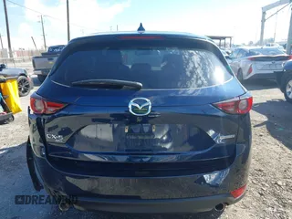 2020 Mazda CX-5 Grand Touring with VIN JM3KFBDM8L0807555, listed as a IAAI auction lot 41612906 with 40,518 mi miles. Bid and sale history available at carsss.com. Image 16.