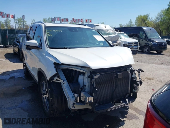 2016 Honda Pilot Touring with VIN 5FNYF6H9XGB005516, listed as a IAAI auction lot 41975049 with 85,217 mi miles. Bid and sale history available at carsss.com. Image 13.