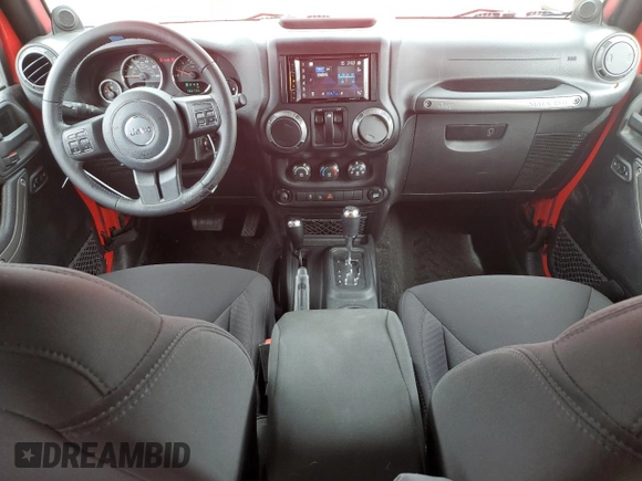2014 Jeep Wrangler Sport with VIN 1C4AJWAG1EL143206, listed as a Copart auction lot 51167695 with 100,734 mi miles and Salvage Title. Bid and sale history available at carsss.com. Image 8.