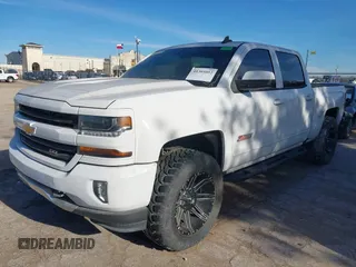 2017 Chevrolet Silverado 1500 LT with VIN 3GCUKREC4HG466329, listed as a IAAI auction lot 41305052 with 57,844 mi miles and . Bid and sale history available at DreamBid. Image 16.