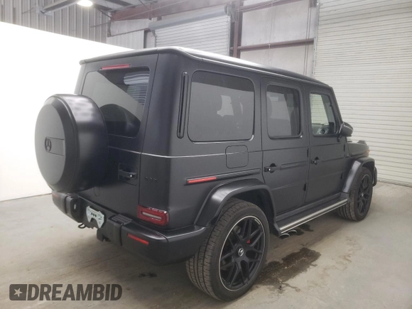 2022 Mercedes-Benz G 63 AMG with VIN W1NYC7HJ2NX444083, listed as a Copart auction lot 64764324 with 7,909 mi miles and Salvage title. Bid and sale history available at DreamBid. Image 3.