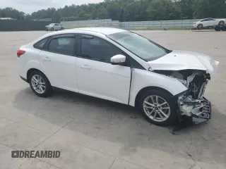 2015 Ford Focus SE with VIN 1FADP3F21FL246821, listed as a Copart auction lot 59732635 with 135,752 mi miles and Salvage title. Bid and sale history available at DreamBid. Image 4.