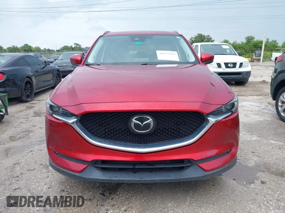2018 Mazda CX-5 Grand Touring with VIN JM3KFADM5J0437365, listed as a IAAI auction lot 42657919 with 96,760 mi miles and . Bid and sale history available at DreamBid. Image 12.
