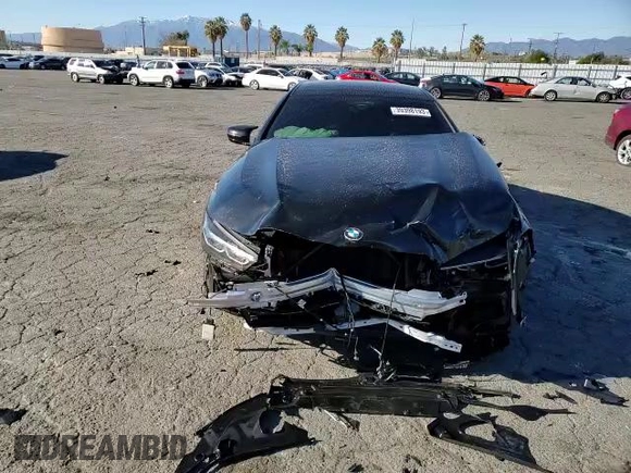 2023 BMW 8 Series M850i with VIN WBAGV8C06PCL57473, listed as a Copart auction lot 39398193 with Not provided miles and . Bid and sale history available at DreamBid. Image 11.