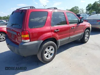 2007 Ford Escape XLT with VIN 1FMYU03197KA34105, listed as a IAAI auction lot 41888661 with 174,717 mi miles and . Bid and sale history available at DreamBid. Image 4.