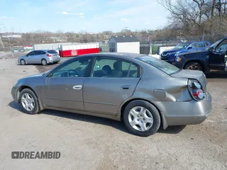 2002 Nissan Altima S with VIN 1N4AL11D92C256180, listed as a IAAI auction lot 41880101 with 112,228 mi miles. Bid and sale history available at carsss.com. Image 15.
