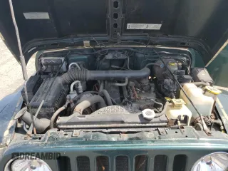 1999 Jeep Wrangler Sahara z VIN 1J4FY49S0XP453920, wystawiony jako Copart lot #61808475 z przebiegiem 129 062 mil mil oraz Czysty tytuł • Clean title. Historia ofert i sprzedaży dostępna na DreamBid. Obrazek 11.