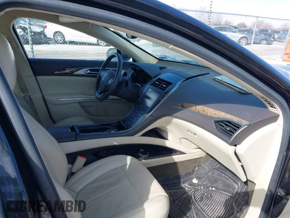 2014 Lincoln MKZ z VIN 3LN6L2GKXER809691, wystawiony jako IAAI lot #41588488 z przebiegiem 163 552 mil mil oraz . Historia ofert i sprzedaży dostępna na DreamBid. Obrazek 5.