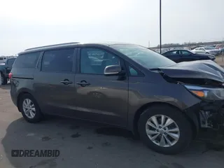 2017 Kia Sedona LX with VIN KNDMB5C19H6329933, listed as a IAAI auction lot 41796158 with 101,399 mi miles. Bid and sale history available at carsss.com. Image 14.