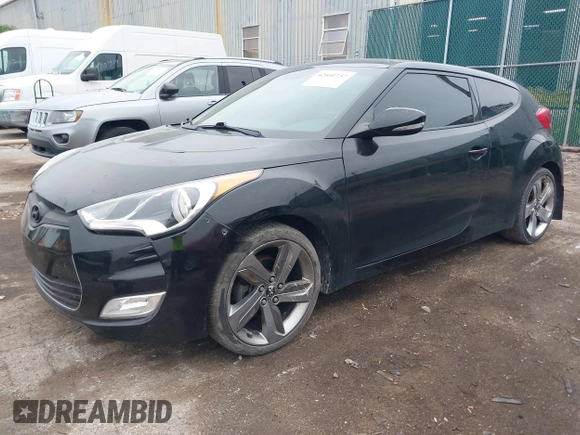 2013 Hyundai Veloster w/Black Int with VIN KMHTC6AD7DU170049, listed as a IAAI auction lot 42441737 with 101,924 mi miles and . Bid and sale history available at DreamBid. Image 2.