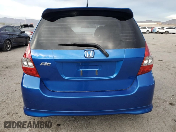 2007 Honda Fit Sport z VIN JHMGD38697S018037, wystawiony jako Copart lot #80060584 z przebiegiem 69 958 mil mil oraz Szkoda całkowita • Salvage title. Historia ofert i sprzedaży dostępna na DreamBid. Obrazek 6.