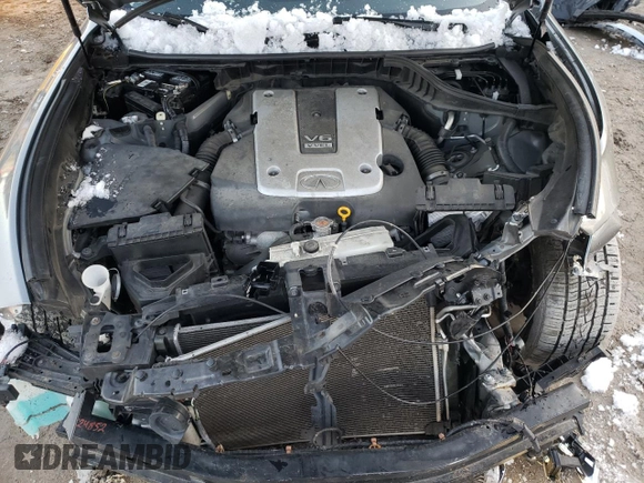 2015 Infiniti Q70 z VIN JN1BY1PR0FM830851, wystawiony jako Copart lot #87606685 z przebiegiem 116 148 mil mil oraz Szkoda całkowita • Salvage title. Historia ofert i sprzedaży dostępna na DreamBid. Obrazek 11.