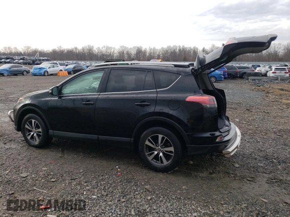 2018 Toyota RAV4 XLE with VIN 2T3RFREV6JW735352, listed as a Copart auction lot 46938025 with 73,229 mi miles and Salvage title. Bid and sale history available at DreamBid. Image 2.