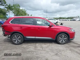 2019 Mitsubishi Outlander SE with VIN JA4AD3A32KZ050801, listed as a IAAI auction lot 42010844 with 72,710 mi miles and . Bid and sale history available at DreamBid. Image 13.