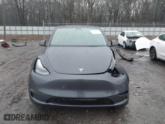 2022 Tesla Model Y Performance with VIN 7SAYGDEF1NF379167, listed as a IAAI auction lot 41429842 with 86,582 mi miles and . Bid and sale history available at DreamBid. Image 13.