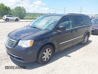 2011 Chrysler Town & Country Touring with VIN 2A4RR5DG7BR697932, listed as a IAAI auction lot 42231254 with 151,866 mi miles and . Bid and sale history available at DreamBid. Image 2.