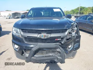 2020 Chevrolet Colorado 2WD Z71 z VIN 1GCGSDEN2L1122555, wystawiony jako IAAI lot #42096724 z przebiegiem 120 679 mil mil oraz . Historia ofert i sprzedaży dostępna na DreamBid. Obrazek 12.