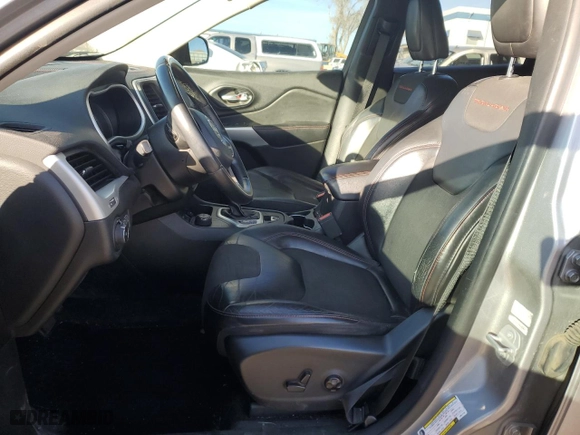 2018 Jeep Cherokee Trailhawk with VIN 1C4PJMBB9JD571773, listed as a Copart auction lot 82876514 with 137,565 mi miles and Salvage Title. Bid and sale history available at carsss.com. Image 7.