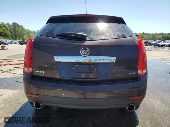 2015 Cadillac SRX Luxury Collection z VIN 3GYFNBE36FS606313, wystawiony jako Copart lot #52767735 z przebiegiem 91 480 mil mil oraz Szkody całkowita. Historia ofert i sprzedaży dostępna na DreamBid. Obrazek 6.