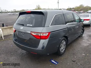 2012 Honda Odyssey EX with VIN 5FNRL5H49CB044488, listed as a IAAI auction lot 41968571 with 128,005 mi miles. Bid and sale history available at carsss.com. Image 4.