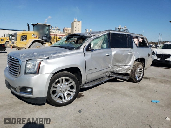 2019 GMC Yukon XL SLT with VIN 1GKS1GKC5KR409622, listed as a Copart auction lot 85703104 with 0 mi miles and Salvage Title. Bid and sale history available at carsss.com. Image 1.