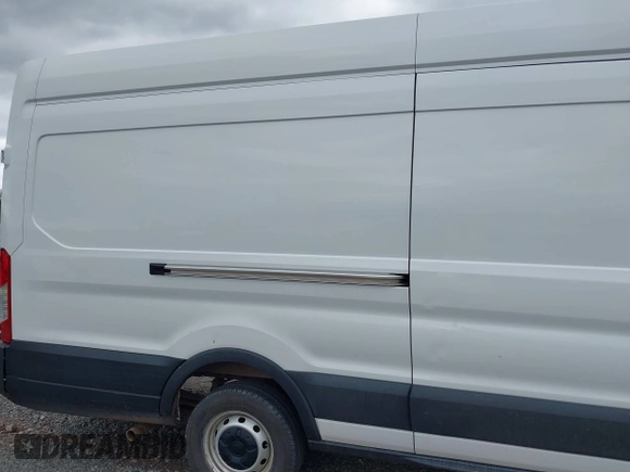 2022 Ford Transit Cargo with VIN 1FTBR3X85NKA74408, listed as a IAAI auction lot 42150248 with 88,887 mi miles and . Bid and sale history available at DreamBid. Image 6.