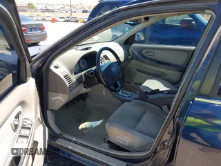 2002 Nissan Maxima GXE with VIN JN1DA31D92T408633, listed as a IAAI auction lot 42804201 with 199,403 mi miles and . Bid and sale history available at DreamBid. Image 5.
