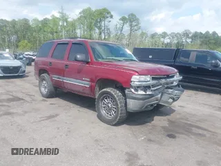 2002 Chevrolet Tahoe LT with VIN 1GNEC13ZX2R326813, listed as a IAAI auction lot 41918241 with 278,409 mi miles. Bid and sale history available at carsss.com. Image 1.