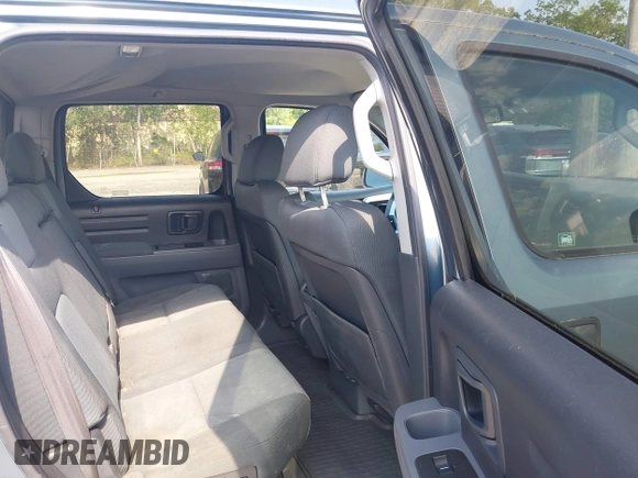 2007 Honda Ridgeline RT z VIN 2HJYK16247H551304, wystawiony jako IAAI lot #42563119 z przebiegiem 160 795 mil mil oraz . Historia ofert i sprzedaży dostępna na DreamBid. Obrazek 8.