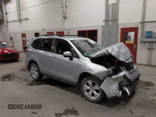 2014 Subaru Forester Touring with VIN JF2SJAMC0EH427091, listed as a IAAI auction lot 42709884 with 77,209 mi miles and . Bid and sale history available at DreamBid. Image 1.